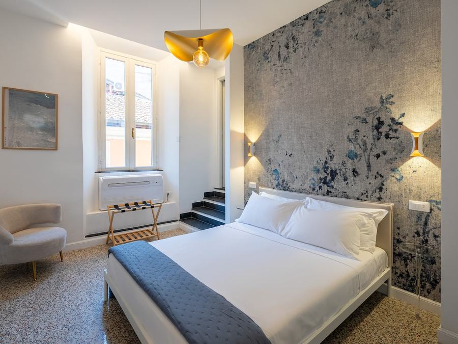 Camera da letto di un appartamento con due camere vicino a Piazza di Spagna